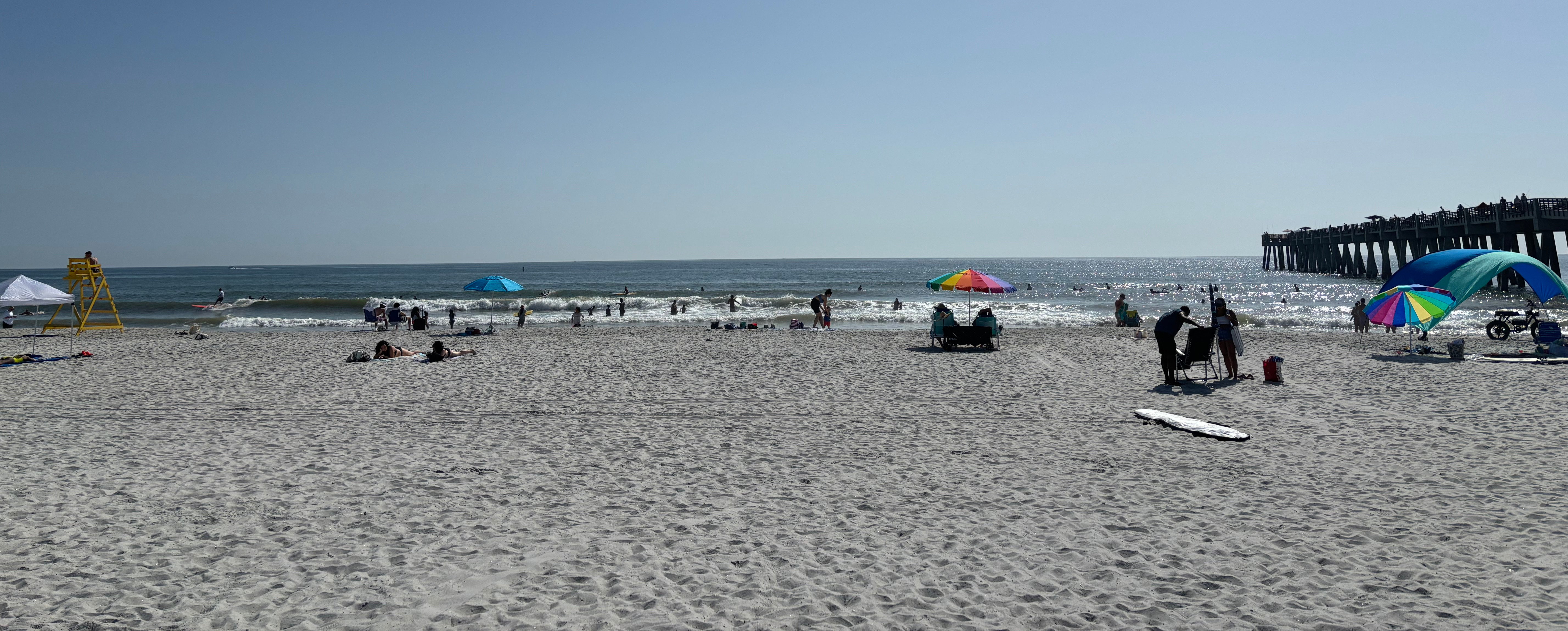 People enjoying Atlantic Ocean, Florida.
